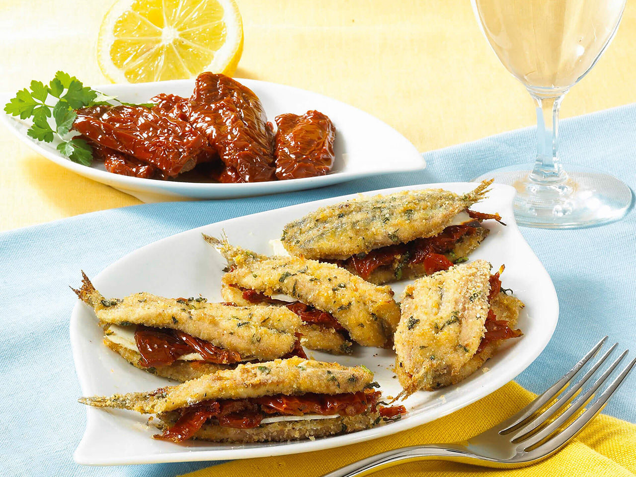 Gebratene Sardellen mit getrockneten Tomaten